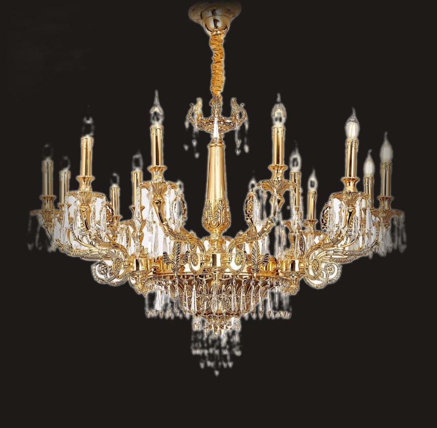 Ornate gold and crystal chandelier on a dark background